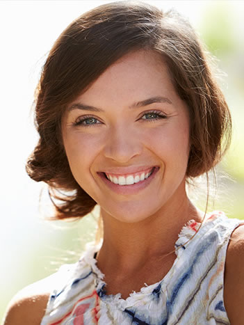 white teeth of woman who used dental bonding