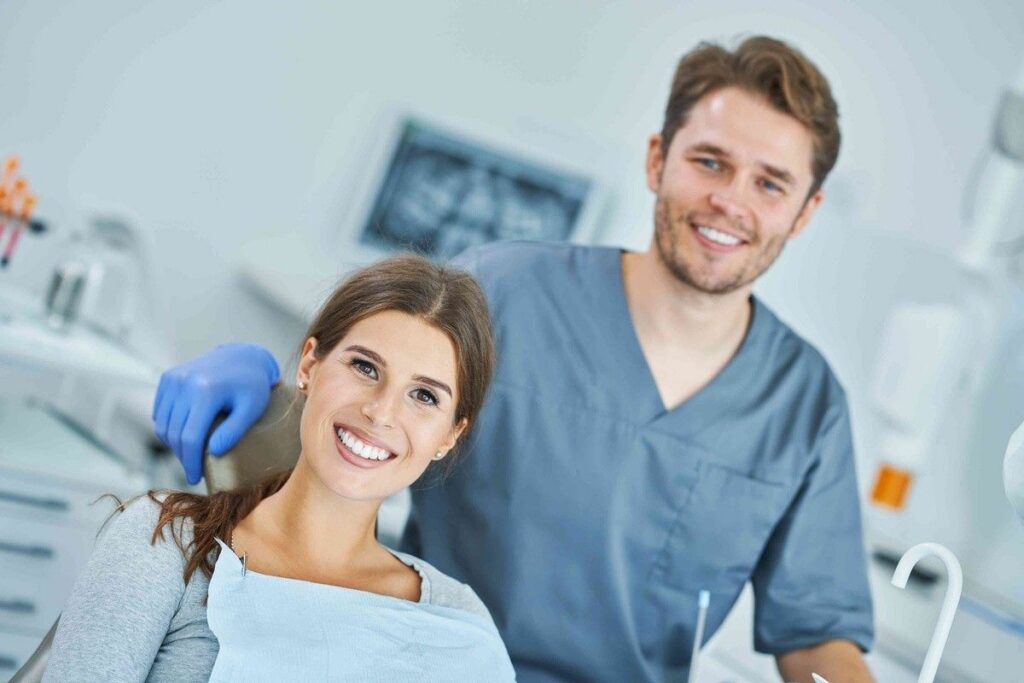 Patient smiling with dentist during a dental visit in a dental office
